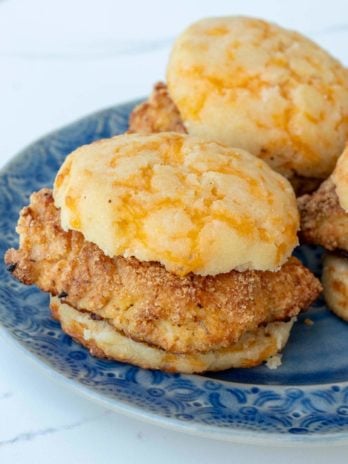 A low carb chicken and biscuit on a blue plate