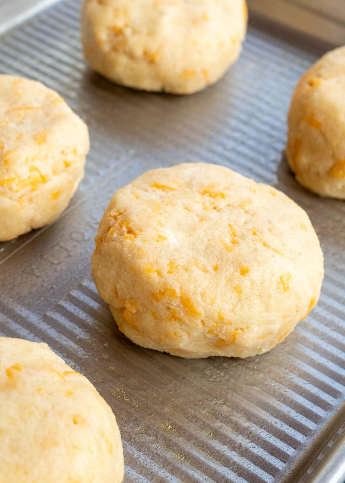 biscuits dough on a baking sheet