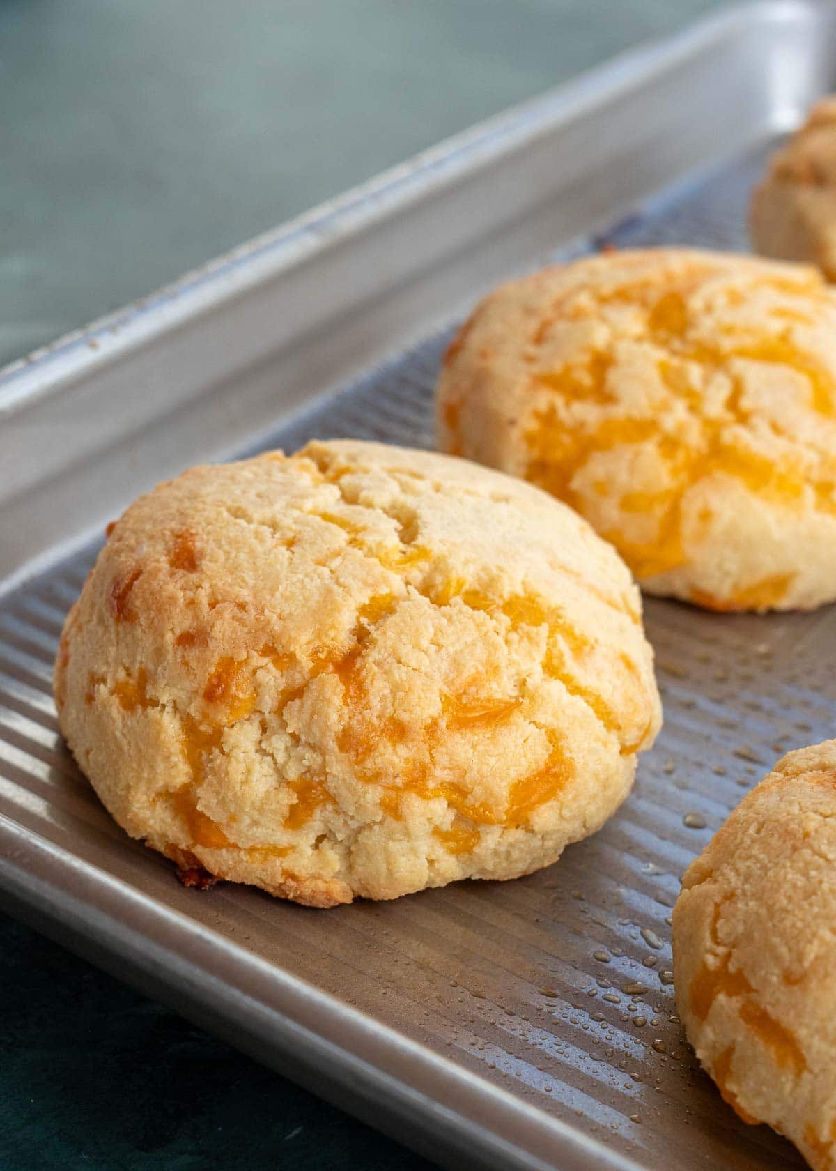 baked biscuits on a baking sheet