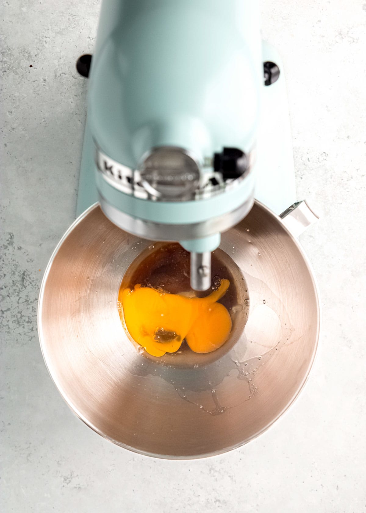 egg, egg yolk, brown sugar, salt, and vanilla extract in a stand mixer bowl