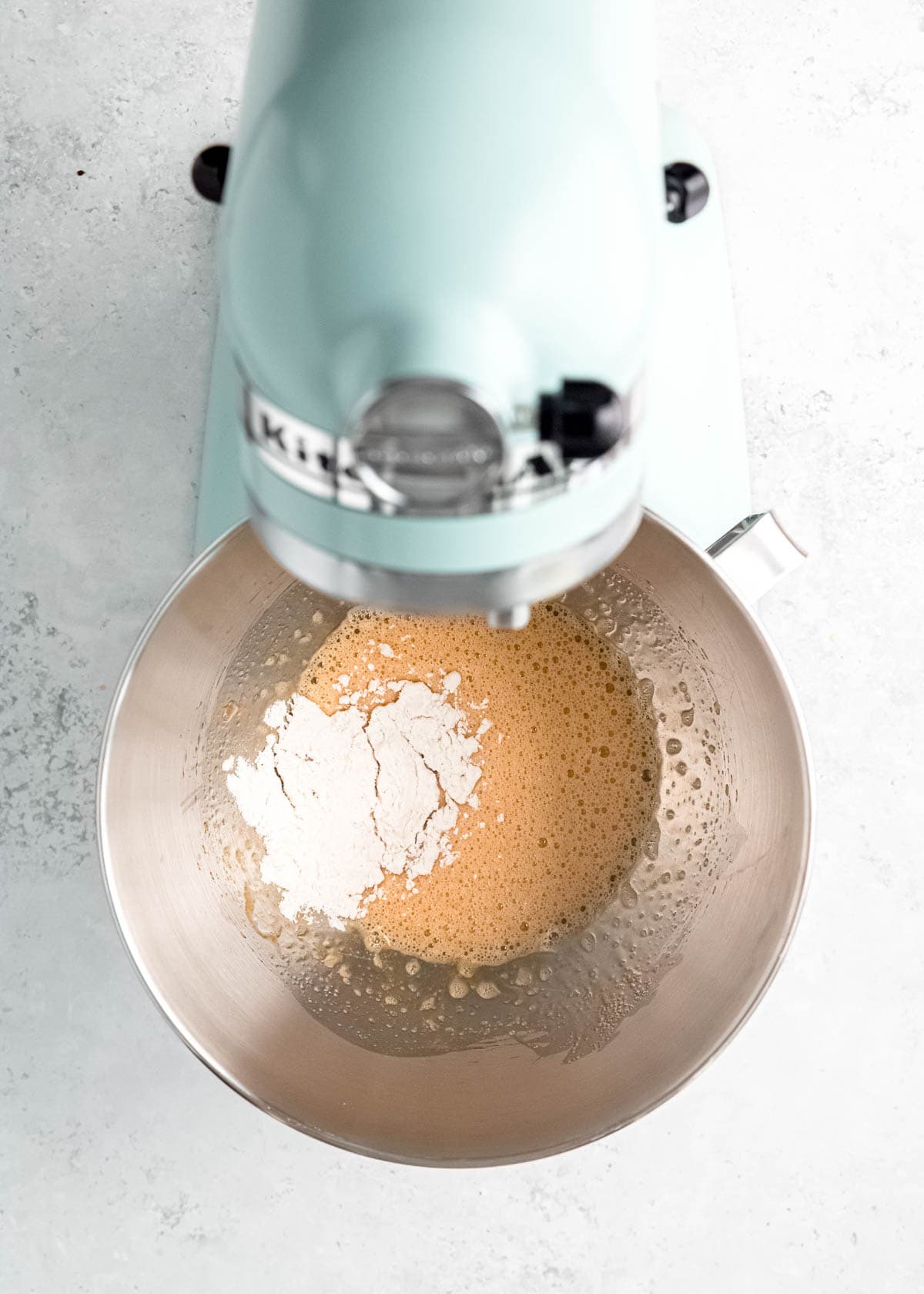 egg mixture with gluten free flour in stand mixer