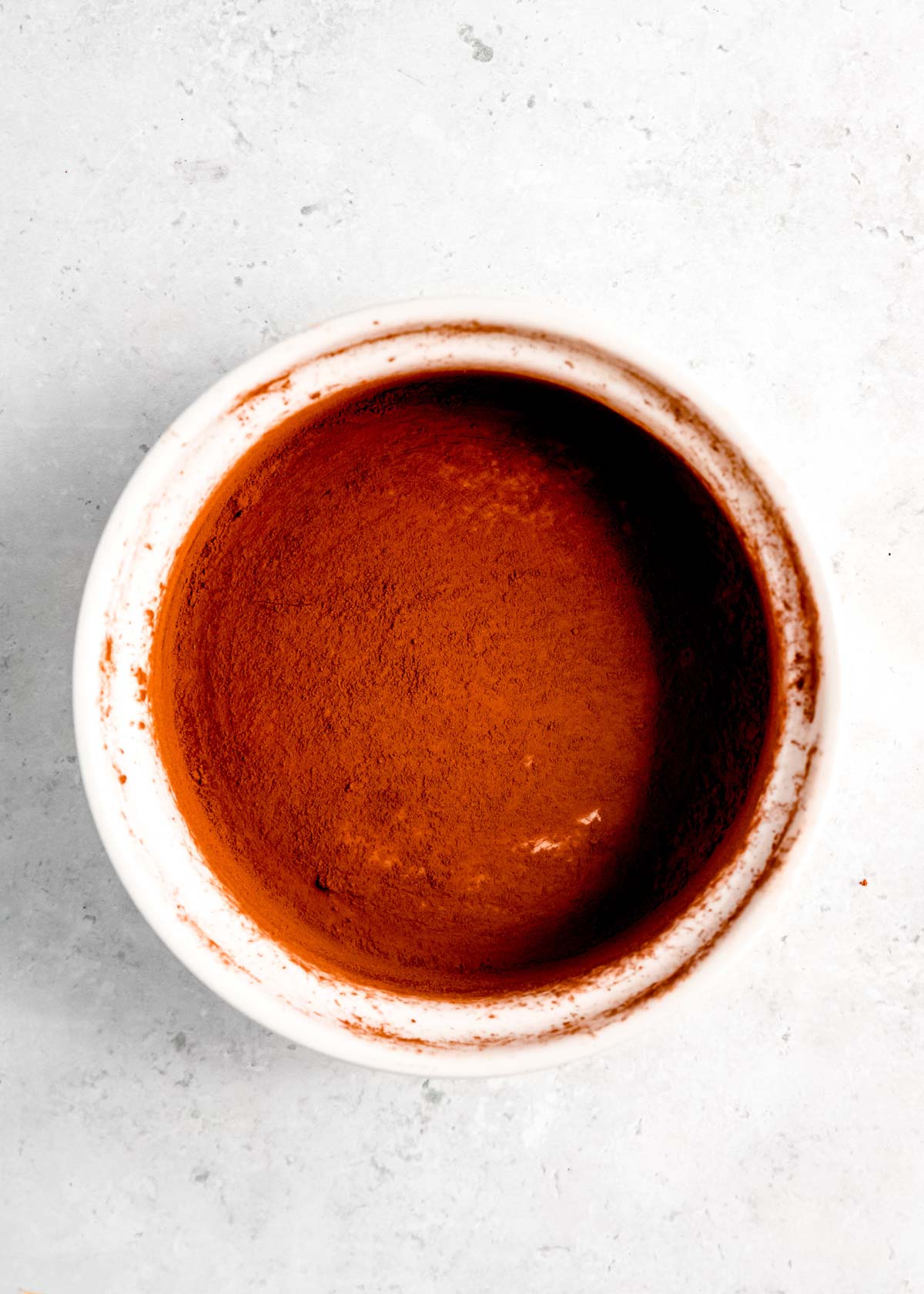 ramekin prepared with butter and cocoa powder