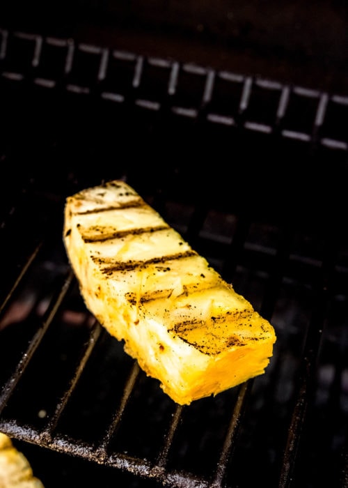 slice of grilled pineapple on grill