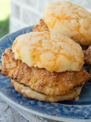 a closeup shot of chicken and biscuits