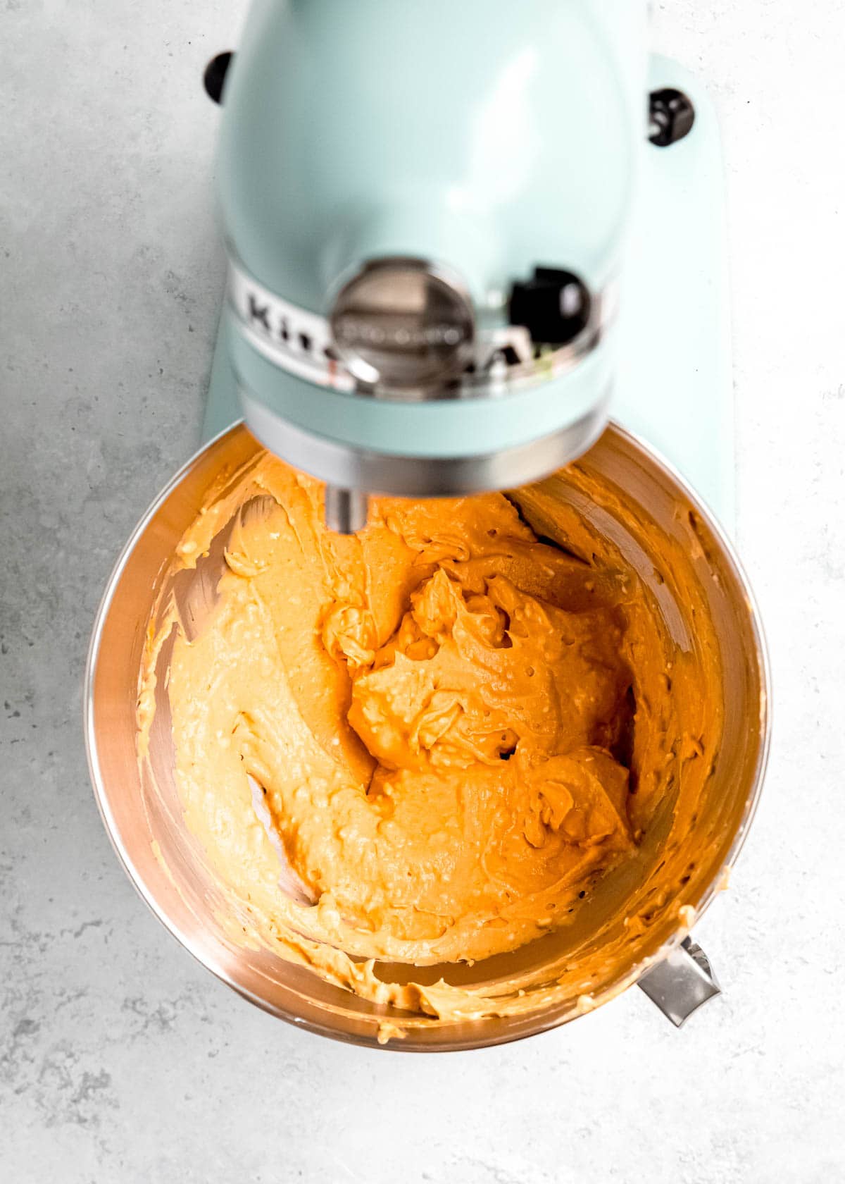 pumpkin cream cheese mixture being blended