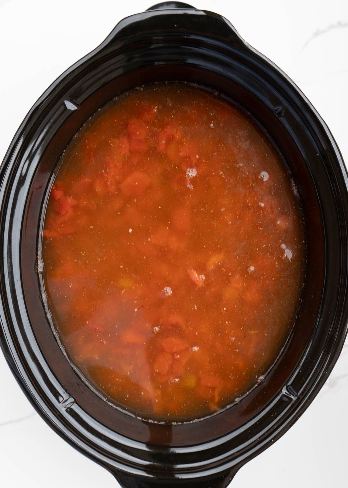 rotel, chicken and broth in slow cooker