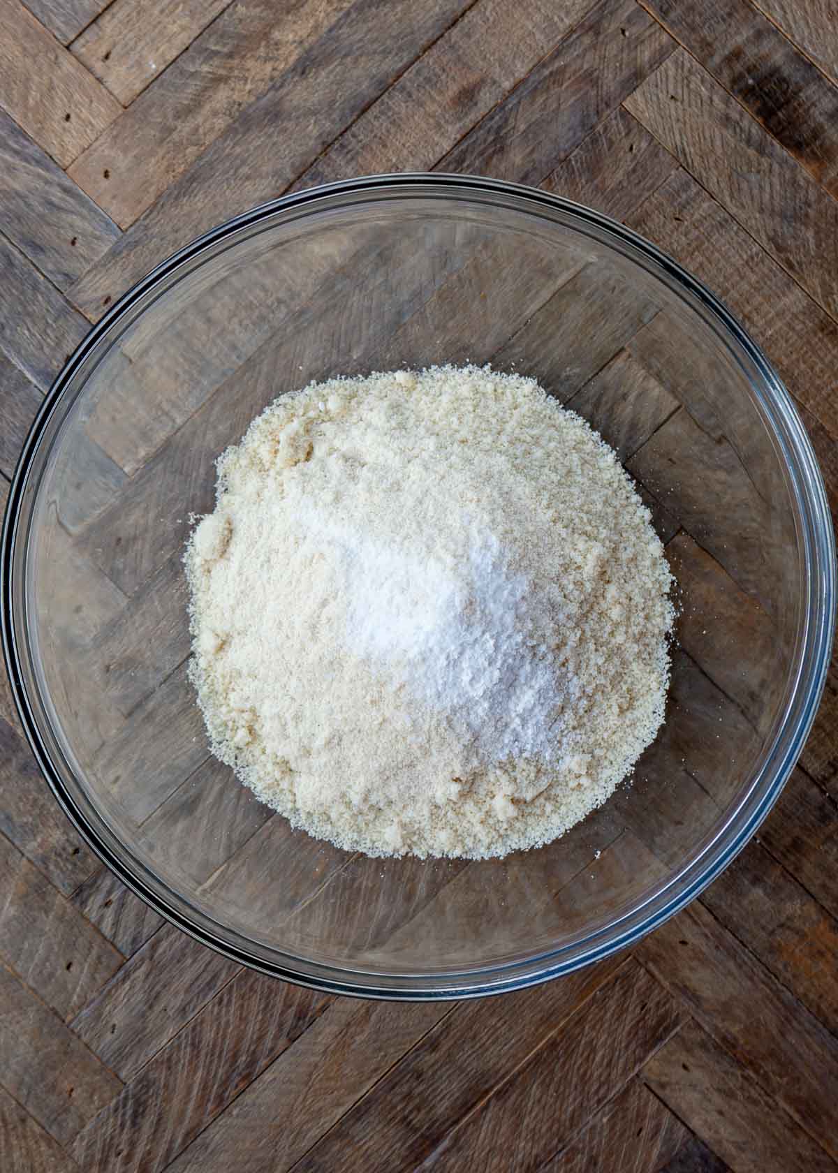 a bowl of coconut, almond flour along with baking soda and salt