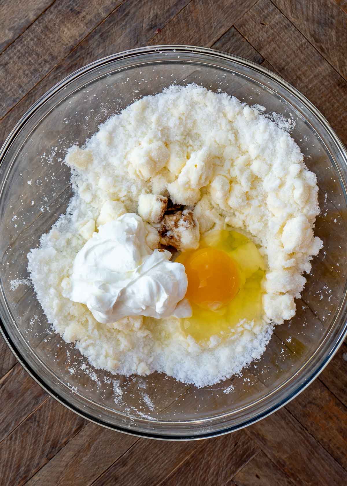 creamed monk fruit and butter with egg, sour cream, and vanilla extract
