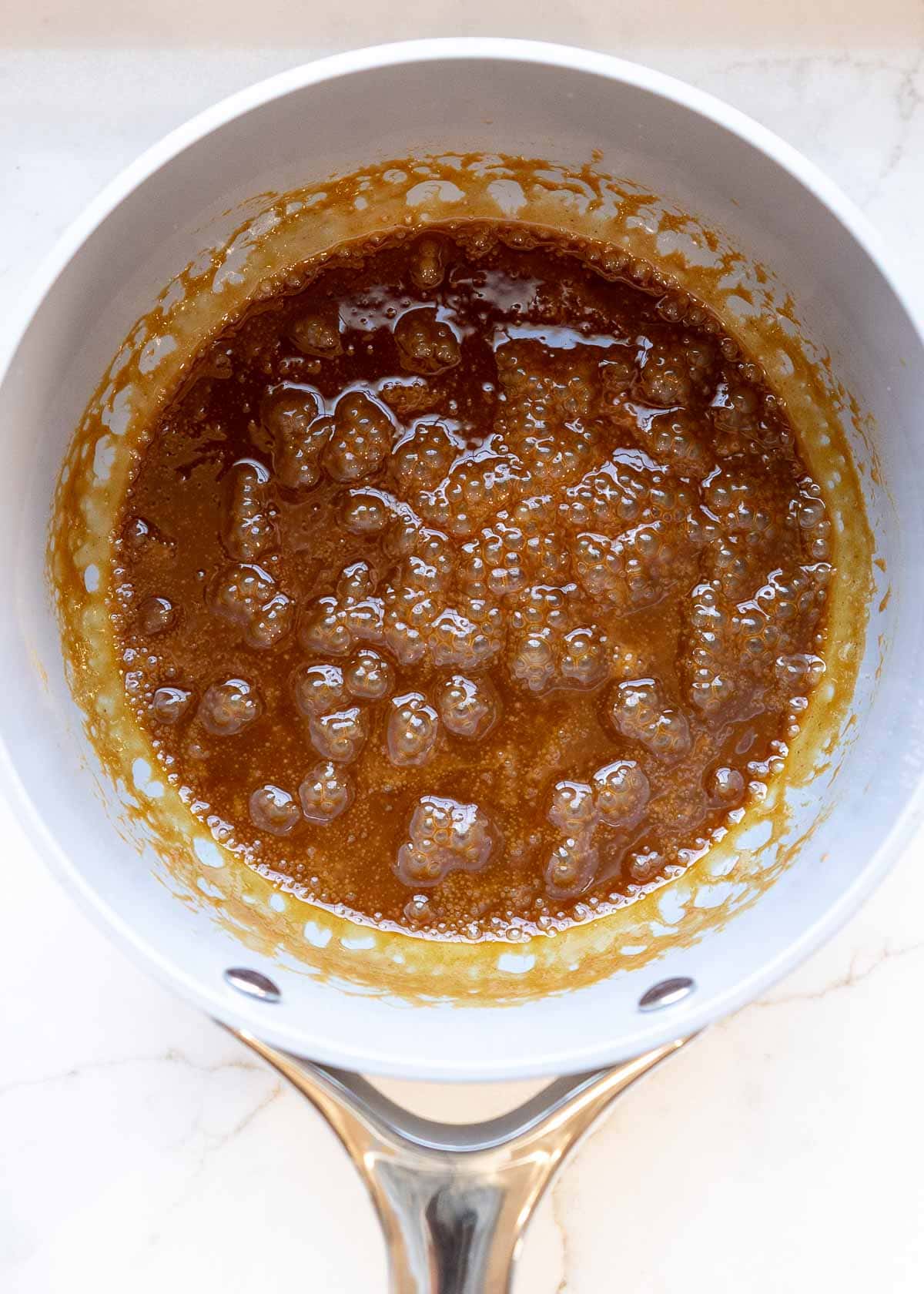 bubbly caramel in a saucepan