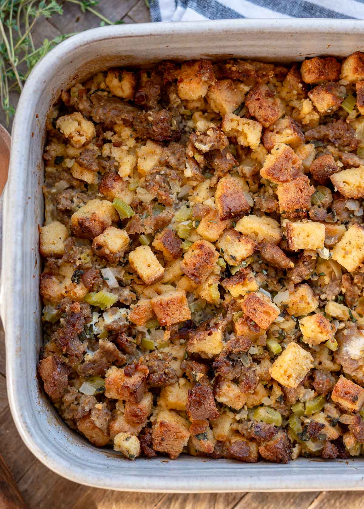 an overhead view of 1/3 of a pan of sausage stuffing