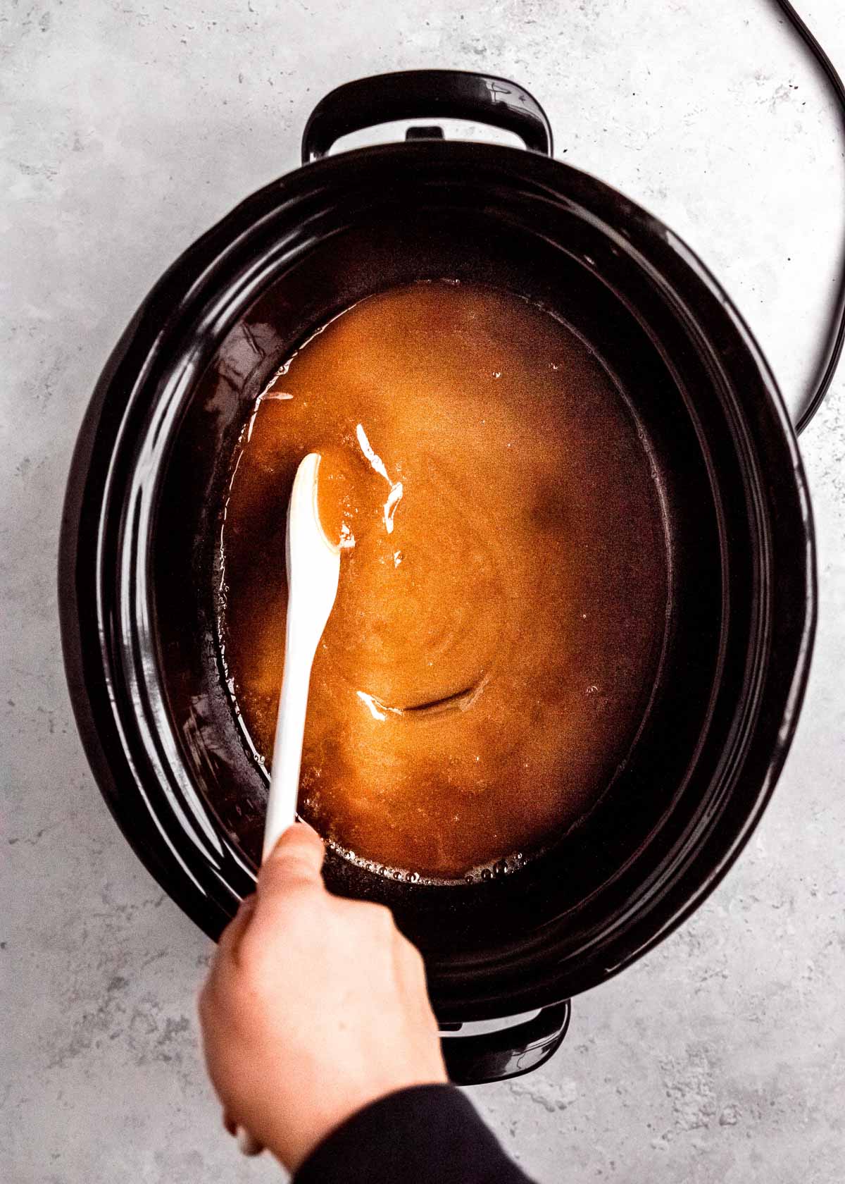 overhead shot of sugar in crock pot