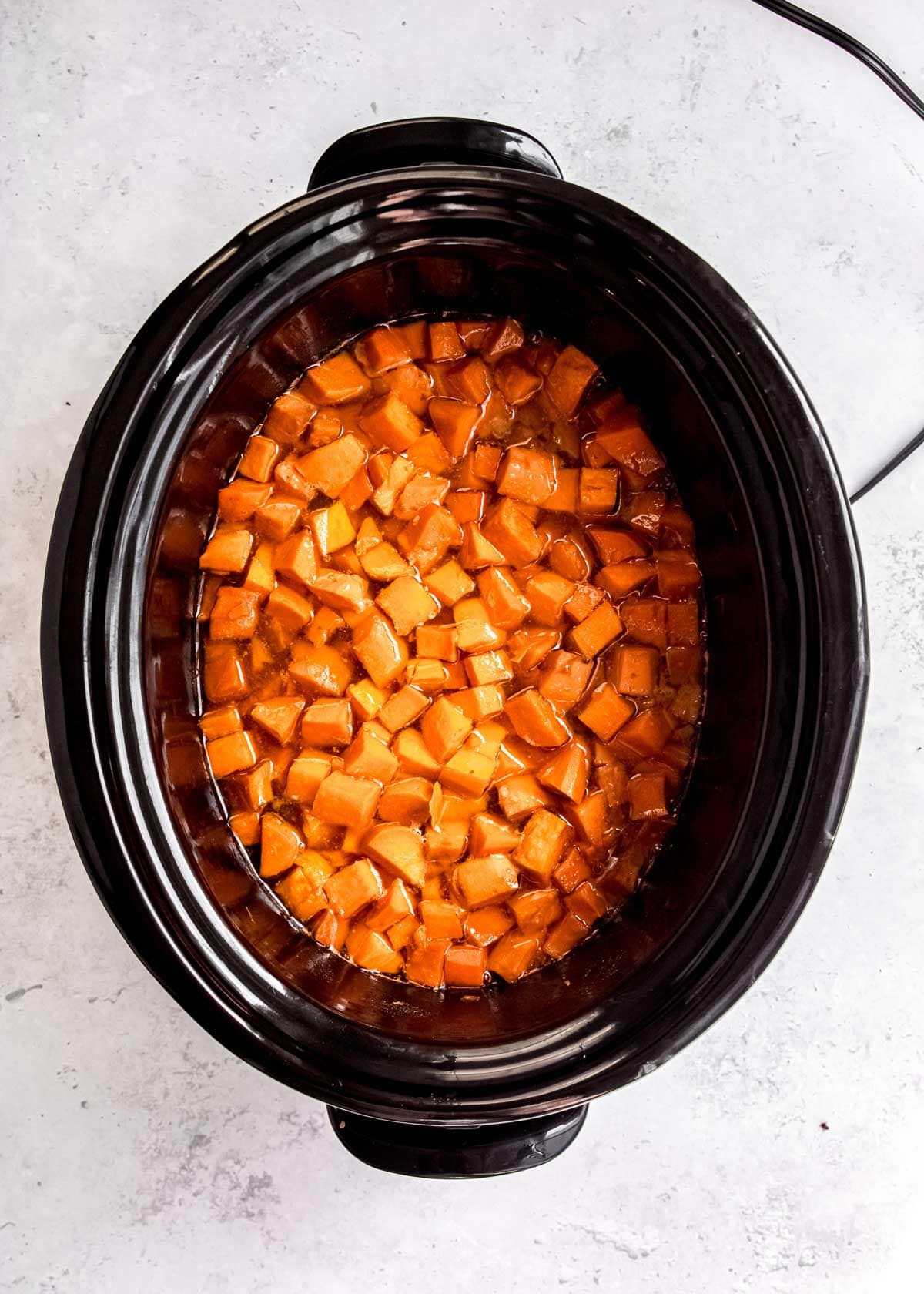 cooked mashed potatoes in slow cooker