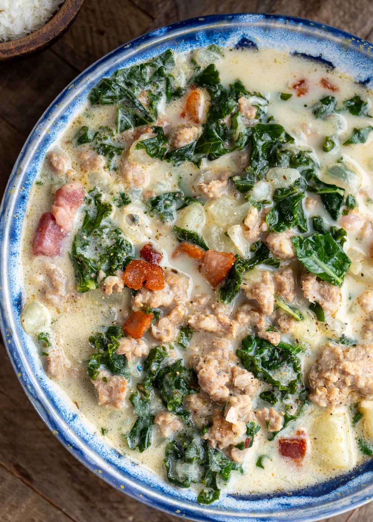 an overhead shot of a bowl of zuppa toscana