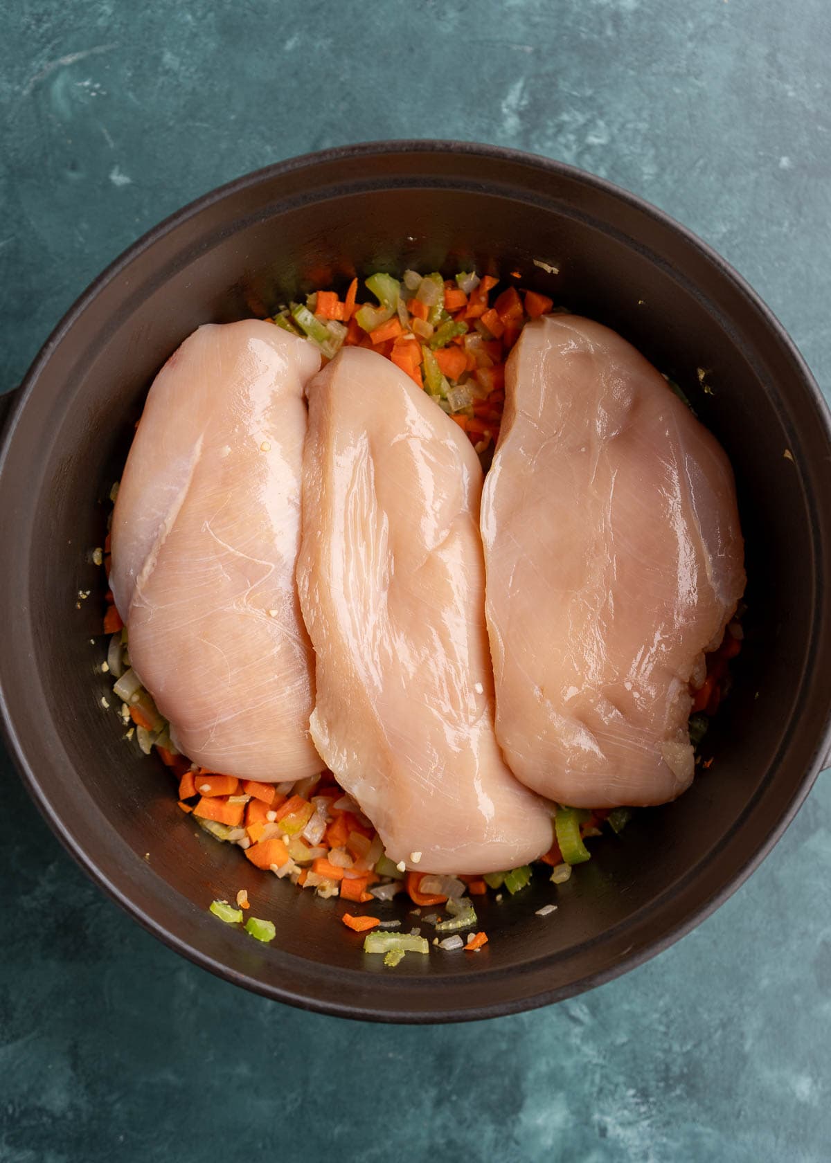 chicken breast and vegetables in dutch oven