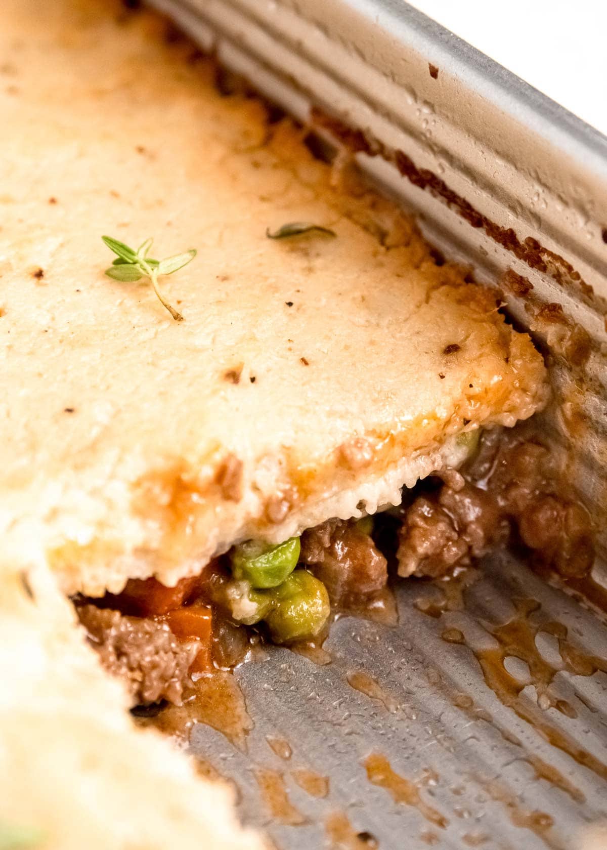 shepherd's pie in silver baking dish showing all the layers