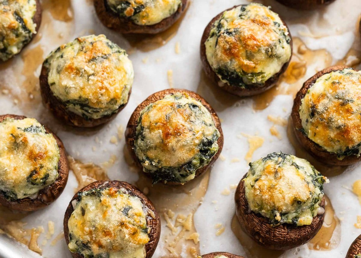 cremini mushrooms stuffed with cheesy spinach mixture