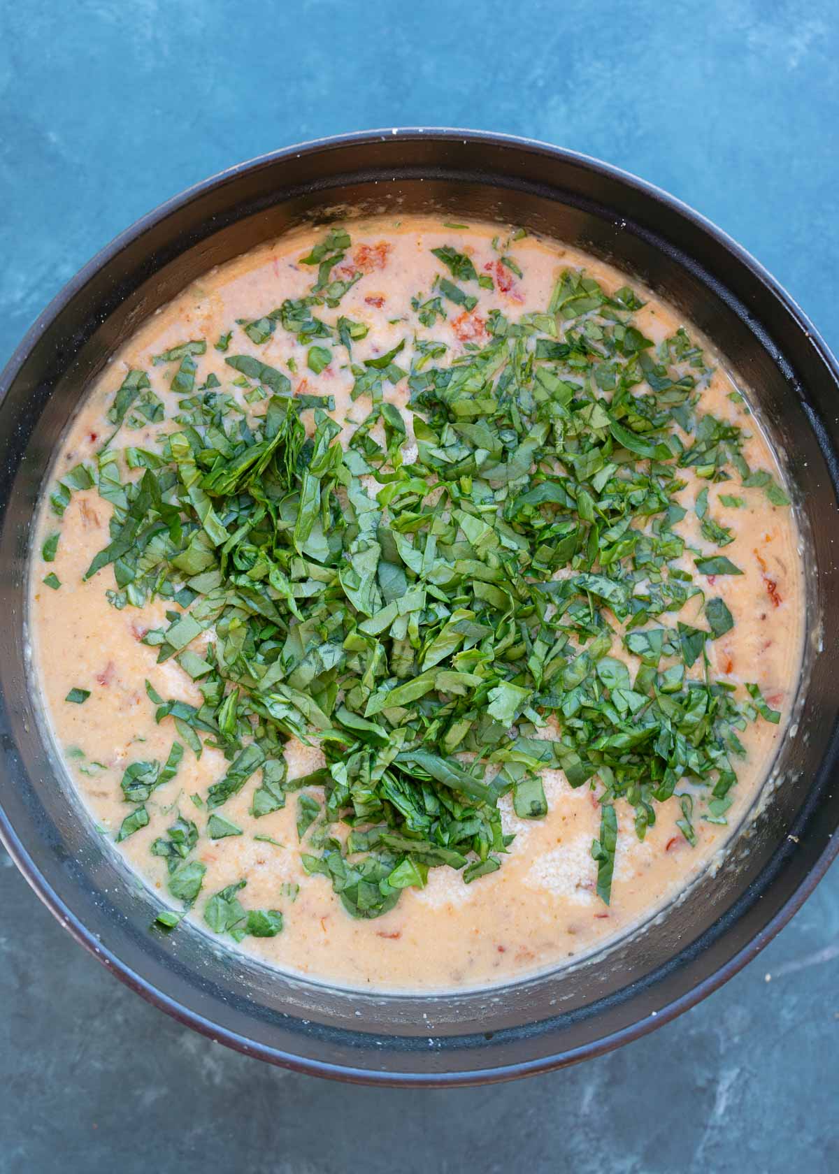 a soup with spinach in a pot