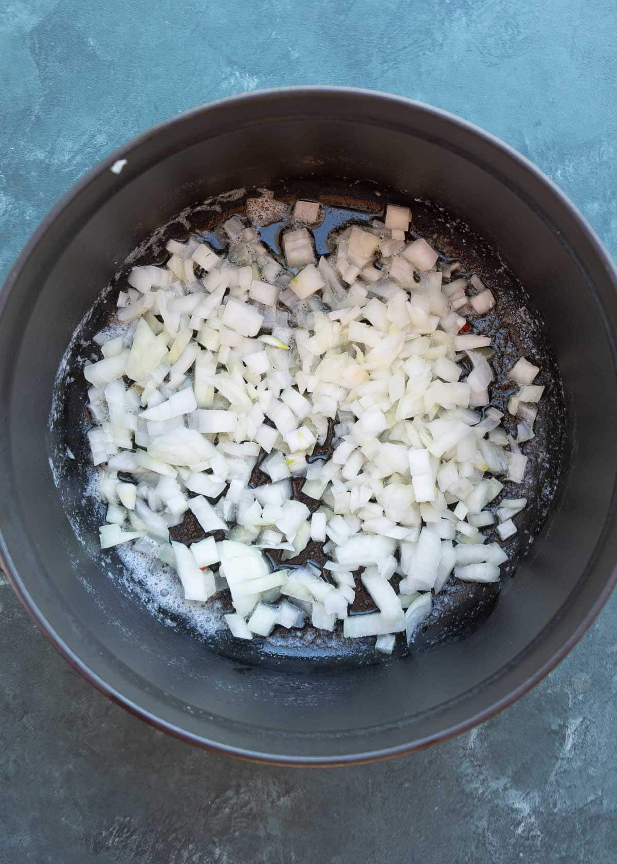 chopped onion in a dutch oven