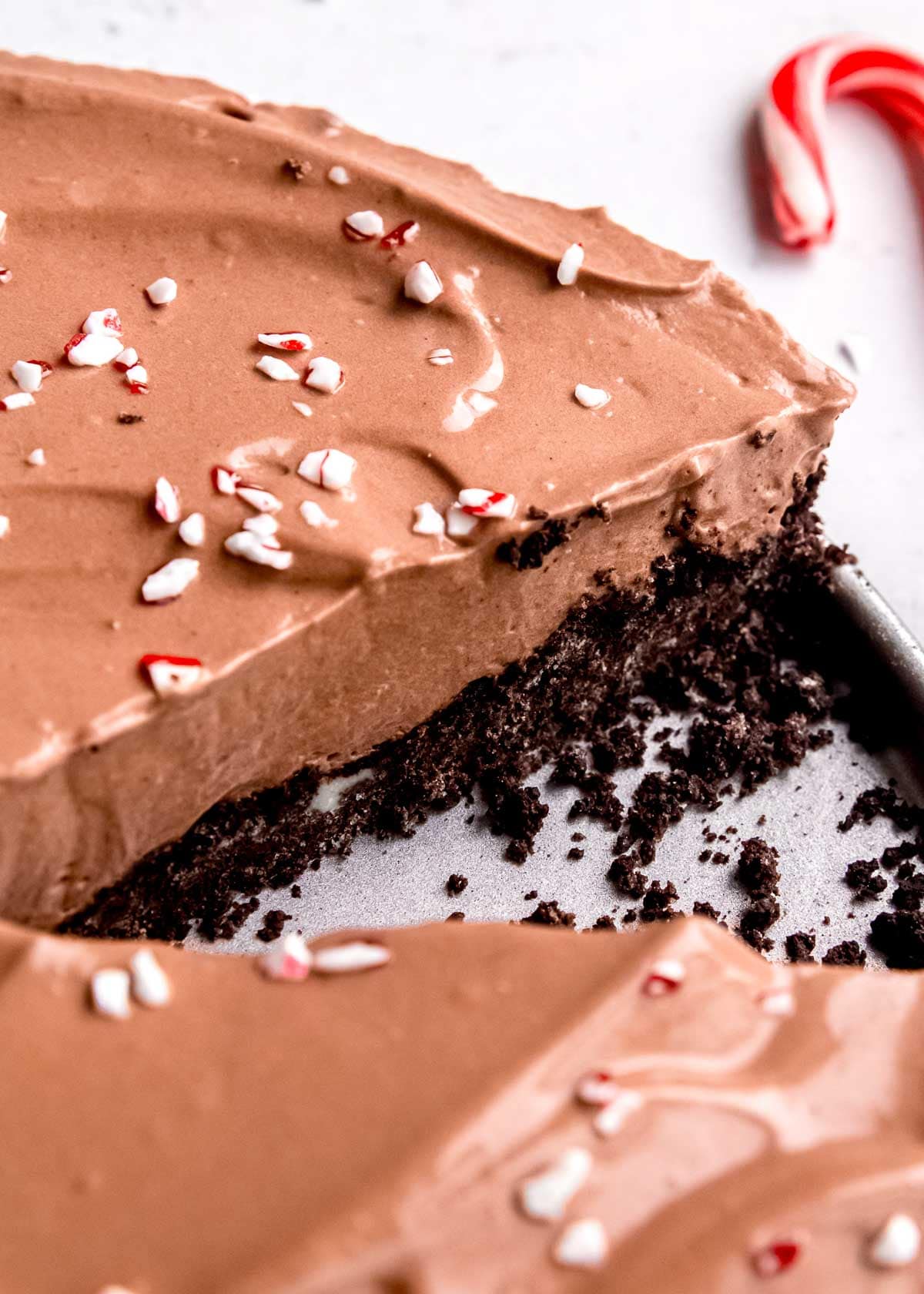 a peppermint mocha pie with a slice missing