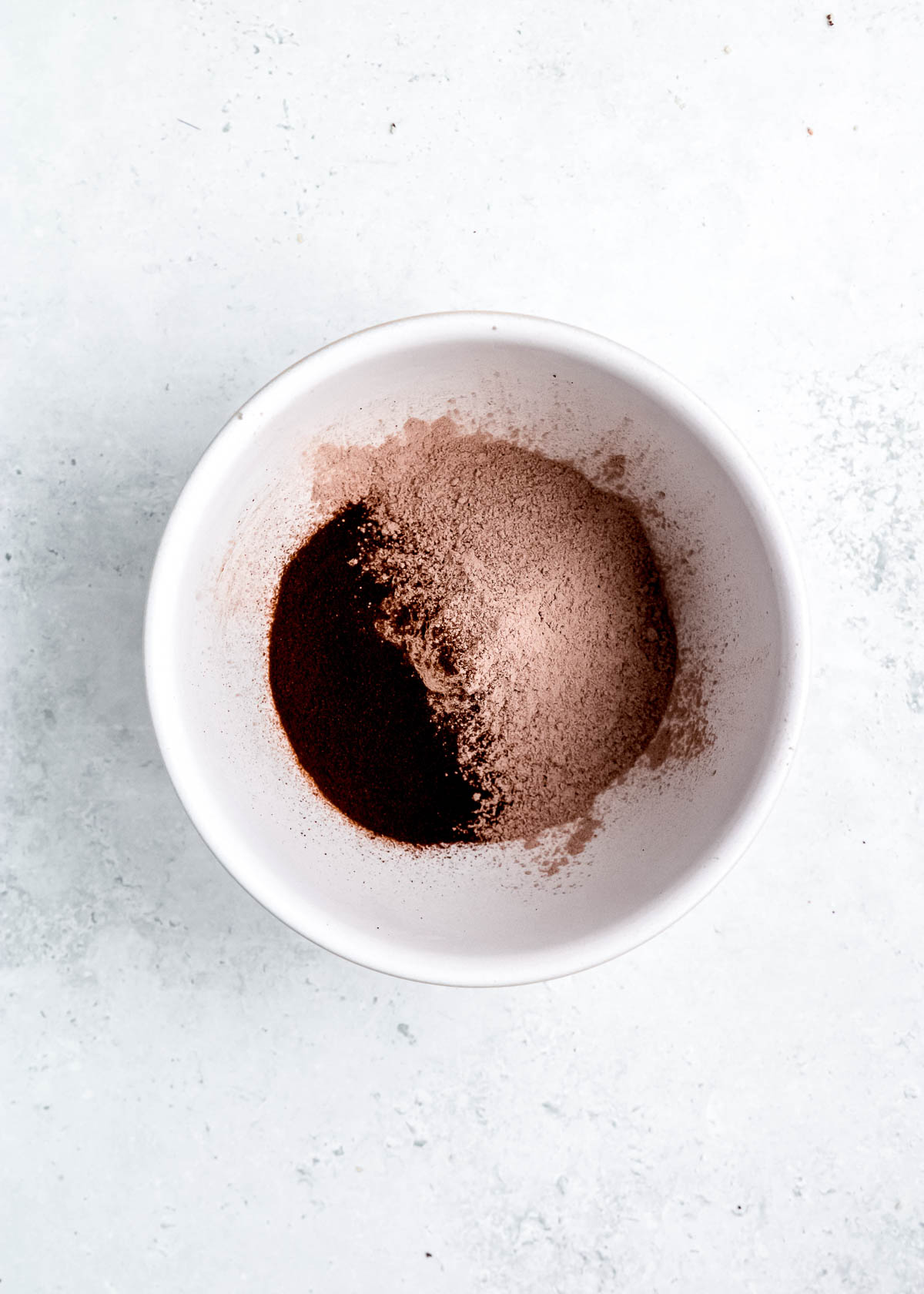 instant chocolate pudding mix, instant espresso, peppermint extract in a bowl
