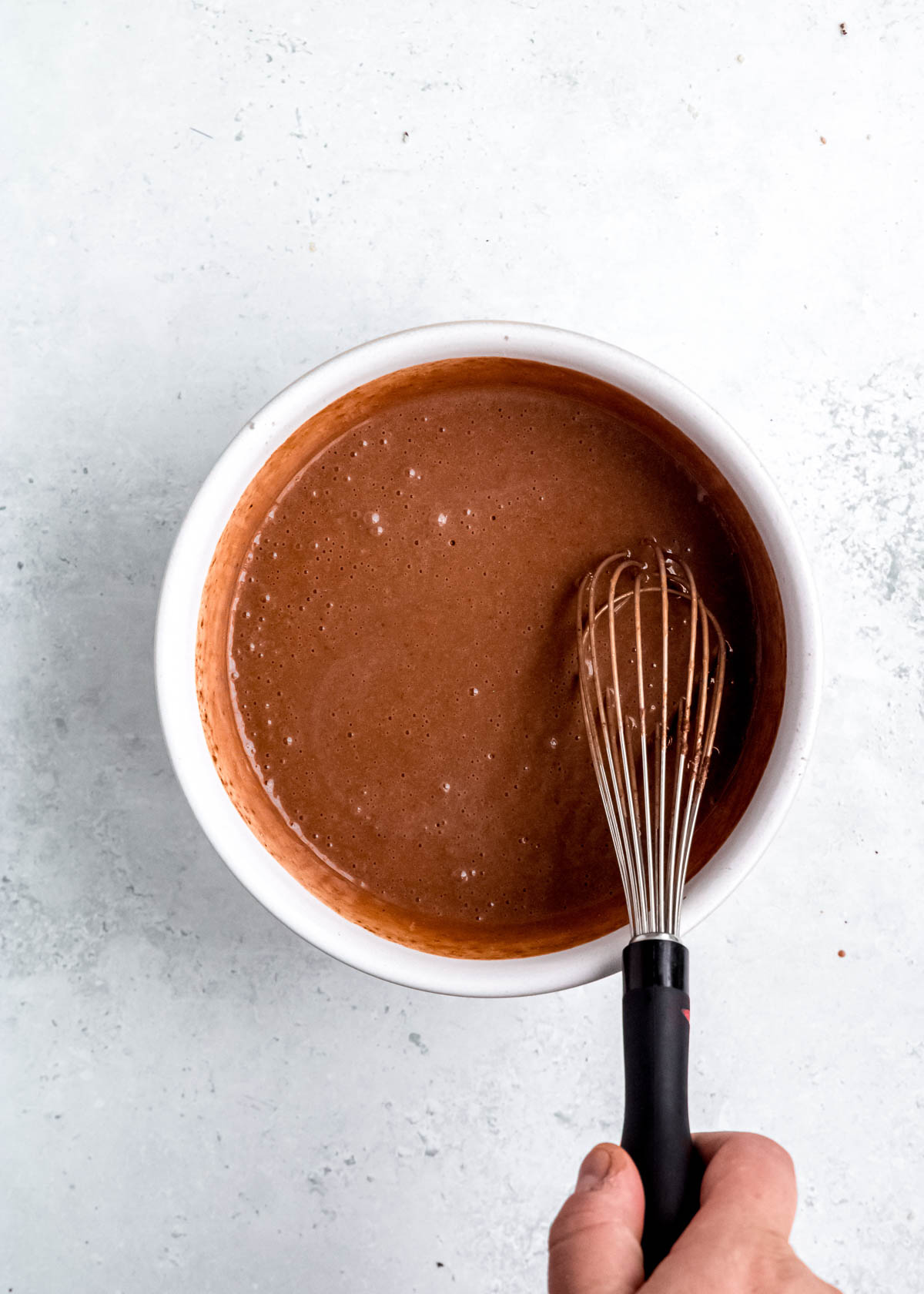 easy mocha peppermint filling made with pudding mix, espresso powder, milk, and peppermint extract whisked in a bowl