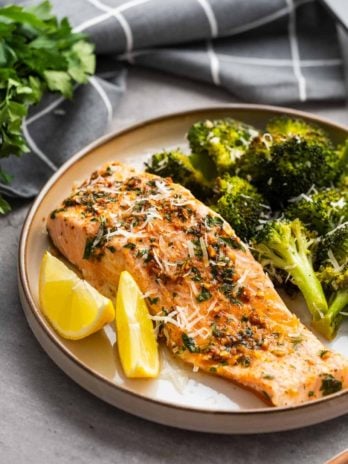 salmon and broccoli on a white plate