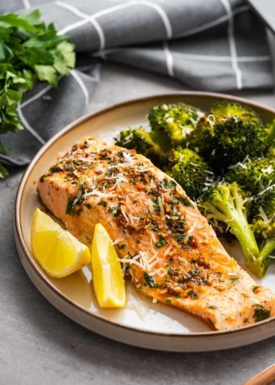 salmon and broccoli on a white plate
