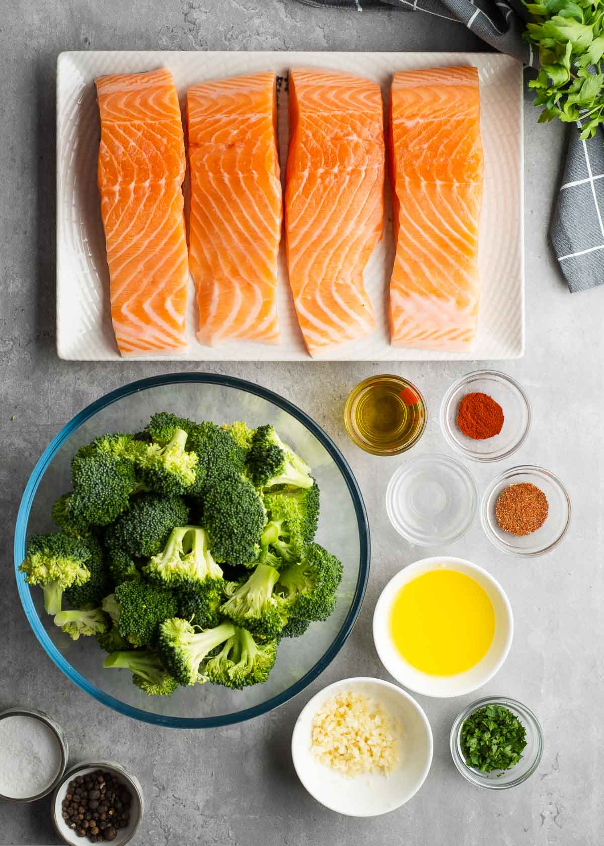 salmon and broccoli ingredients on a white background
