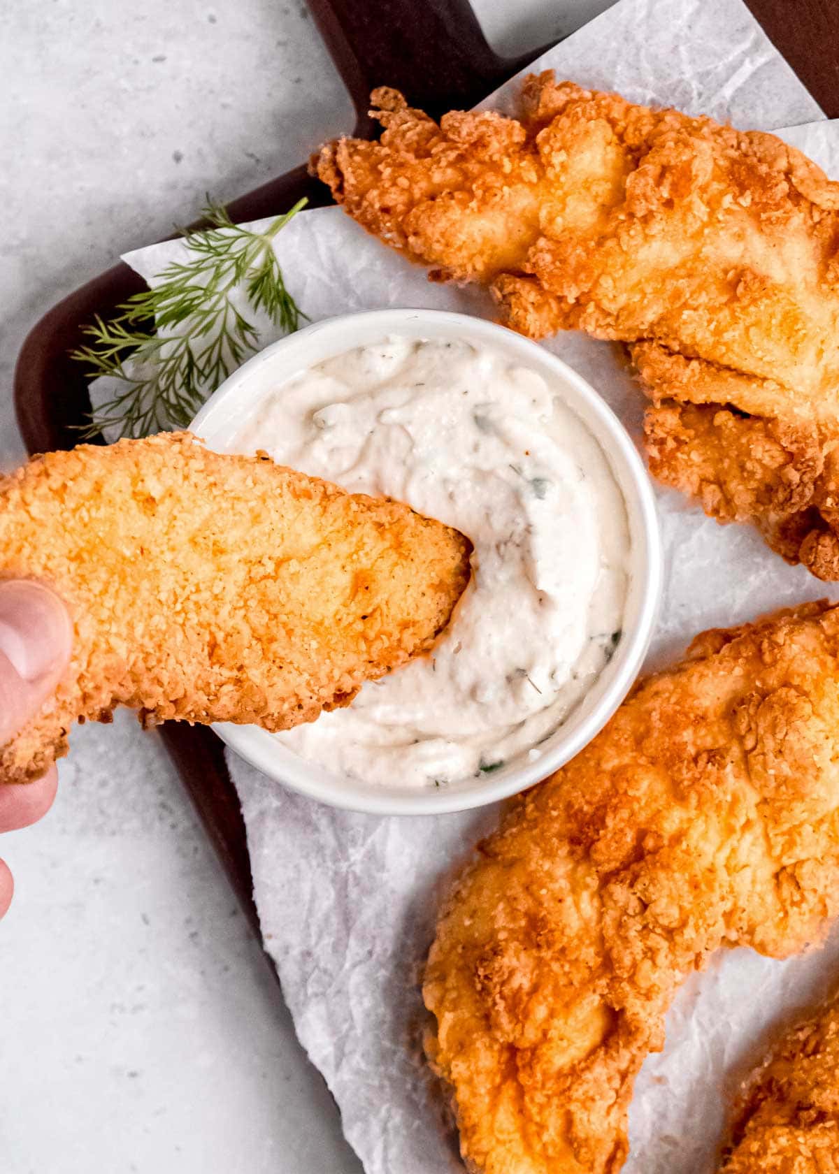 crunchy buttermilk chicken fingers dipped in a homemade super creamy ranch dip