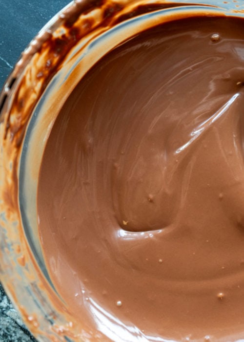 chocolate melted in a glass bowl