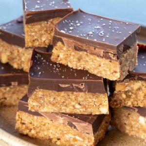 no bake almond bars in a pile on a plate
