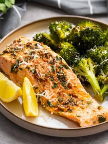 salmon and broccoli on a white plate