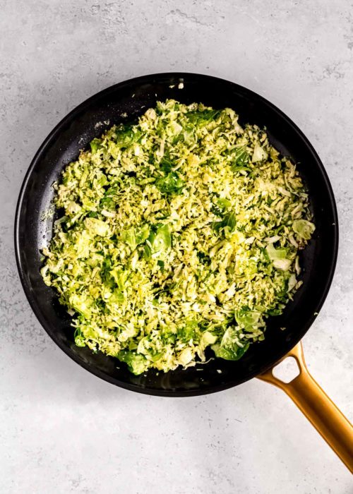 shredded brussels sprouts and garlic in sesame oil