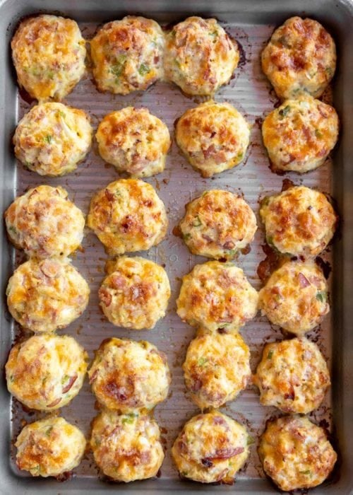 overhead image of cooked denver omelet bites on a sheet pan