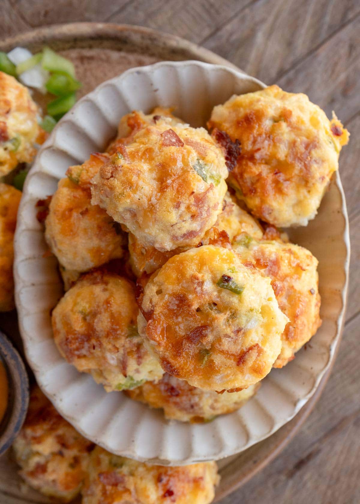 overhead image of stacked denver omelet egg bites on a white plate