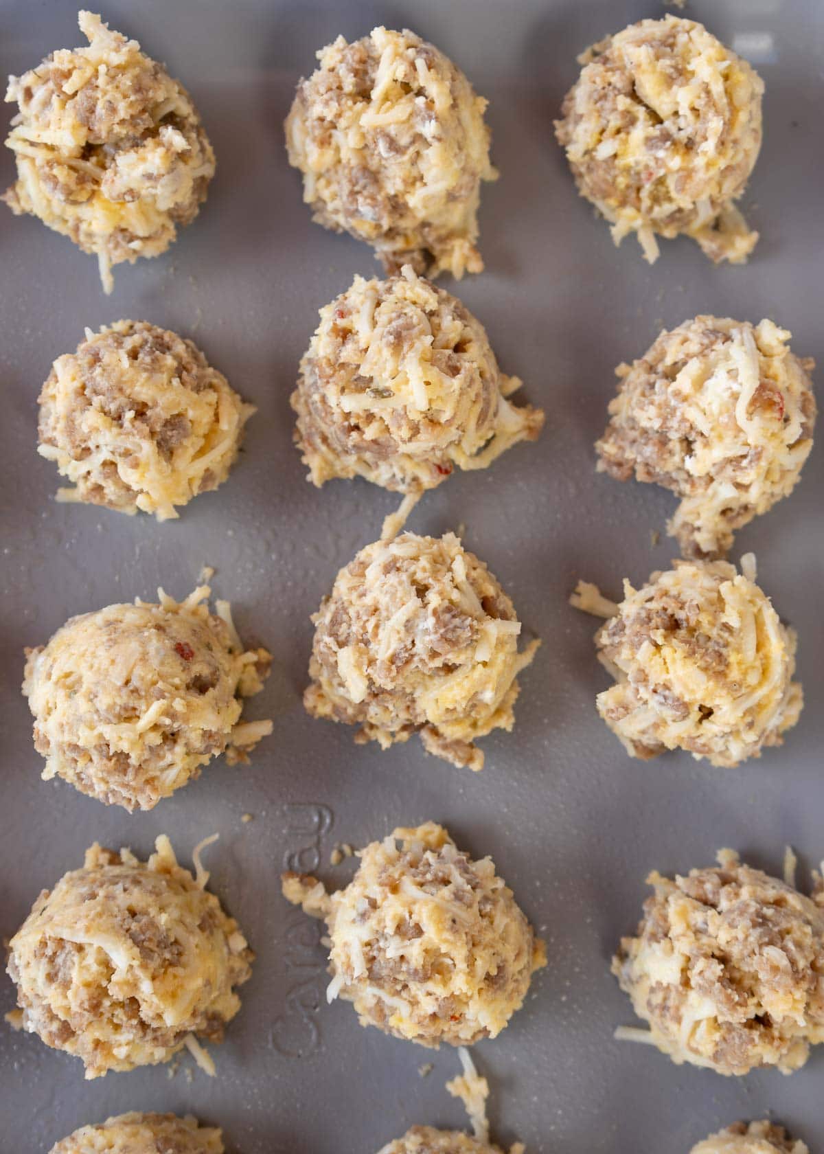 pizza bites on a baking sheet