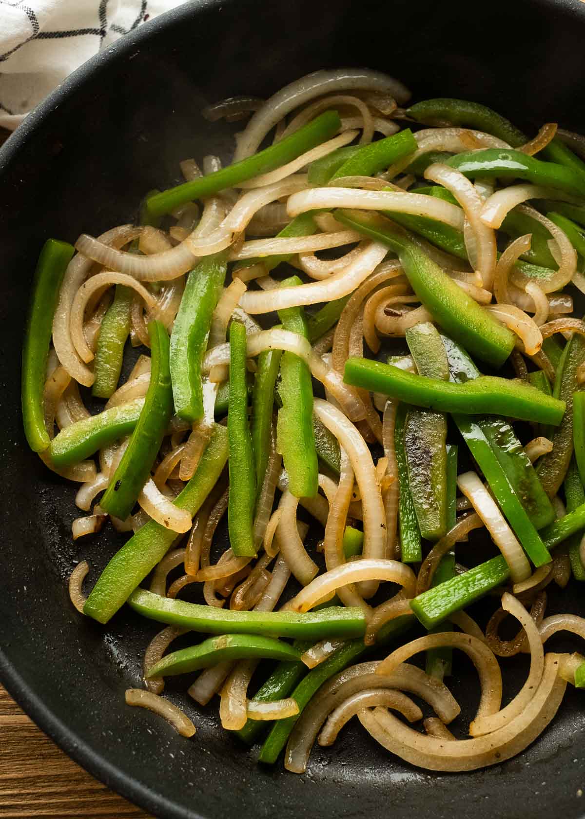 sauteed onions and bell peppers ready for steak lo mein