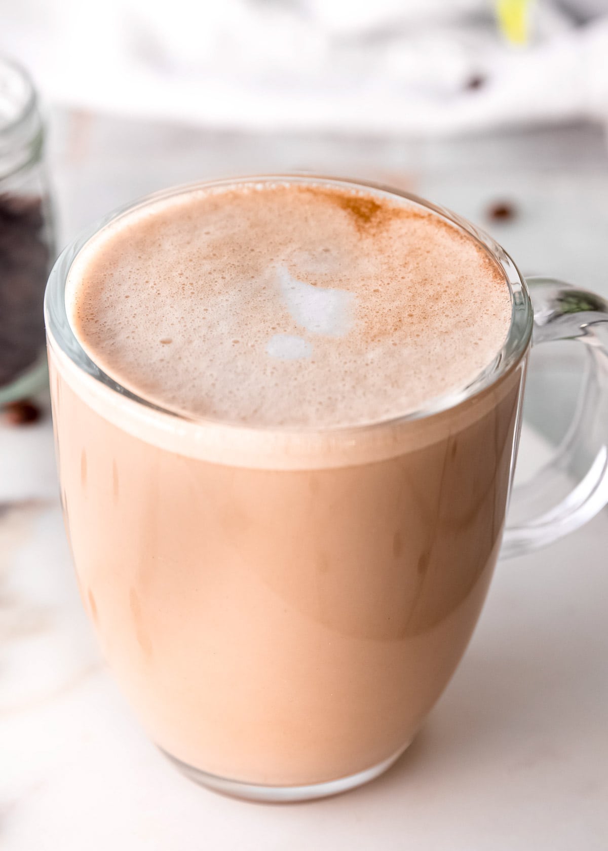 close up, overhead image of almond milk latte