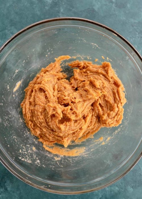 peanut butter cookie dough mixed in a glass bowl