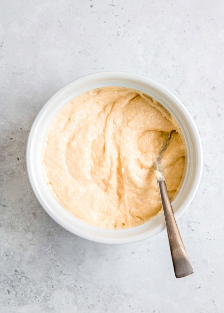 caesar salad dressing in white ramekin