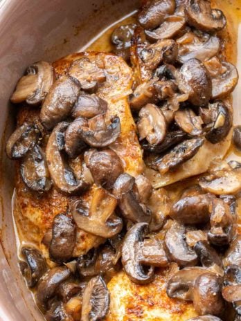 close up overhead image of baked mushroom chicken