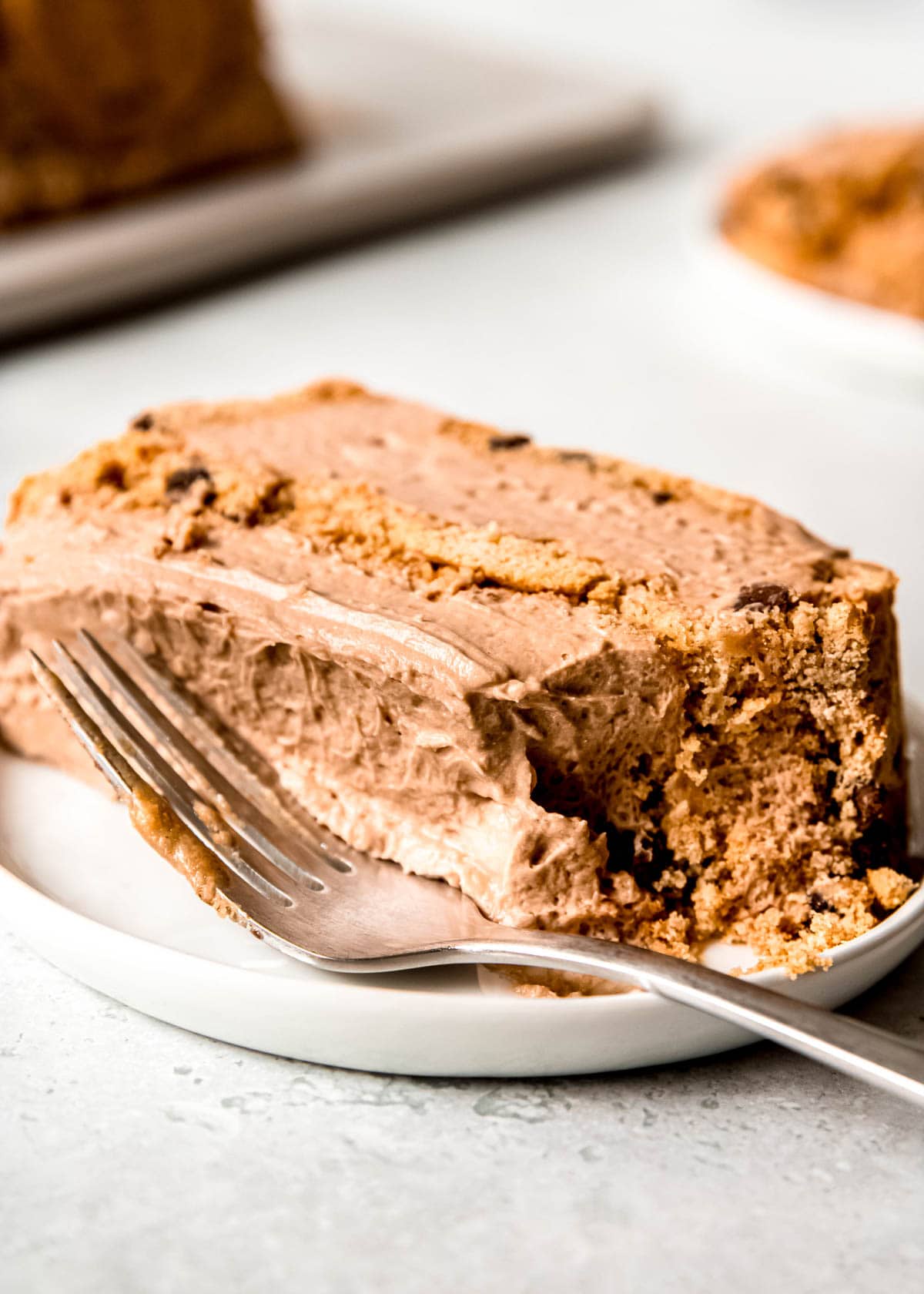 closeup show showing creamy mocha icebox cake with gluten-free cookie layers