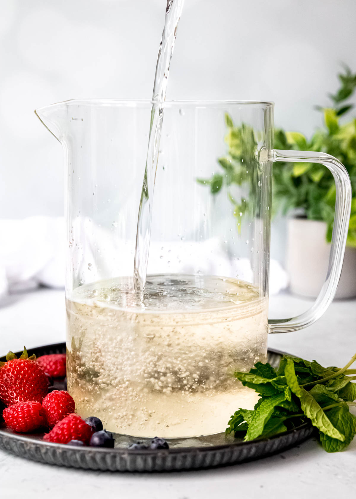 pinot grigio and triple sec poured into a pitcher