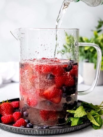sprite poured into a triple berry white sangria recipe