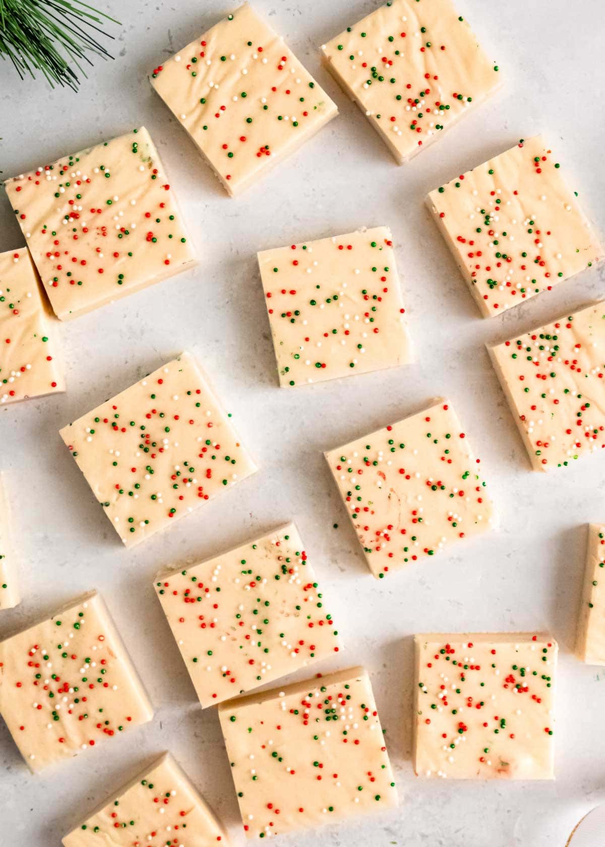 squares of christmas cookie fudge on a countertop