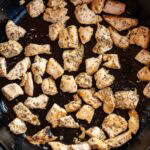 browned chicken in a skillet