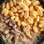 chicken and gnocchi added to the creamy sundried tomato and parmesan sauce