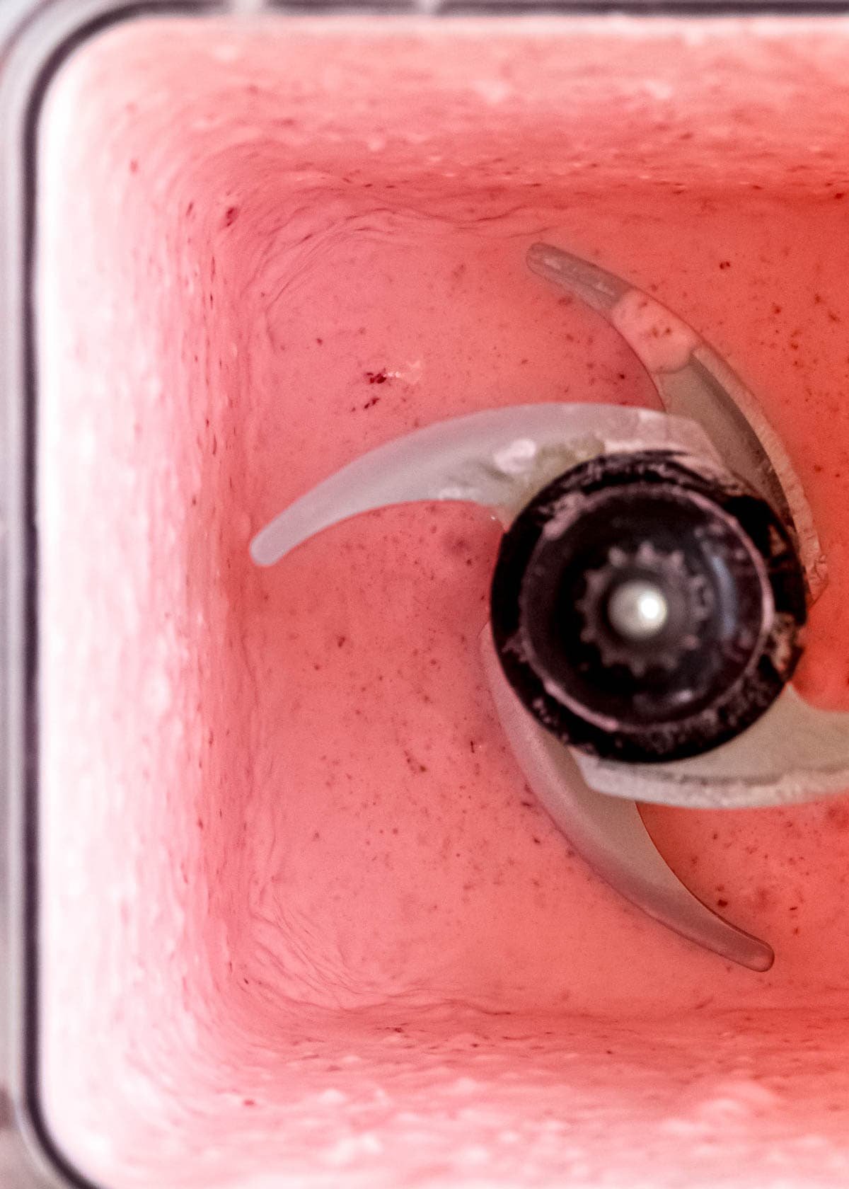 creamy strawberry pudding mixture in a blender