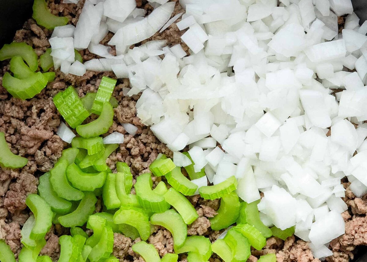 ground beef, celery, and onions in a slow cooker