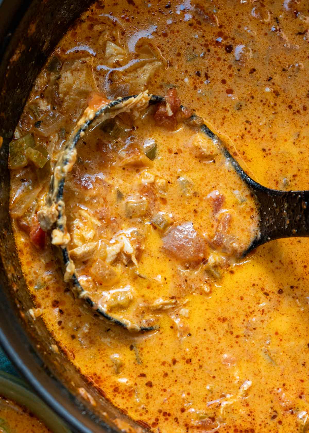 a spicy, creamy soup with heavy cream and cheese stirred in